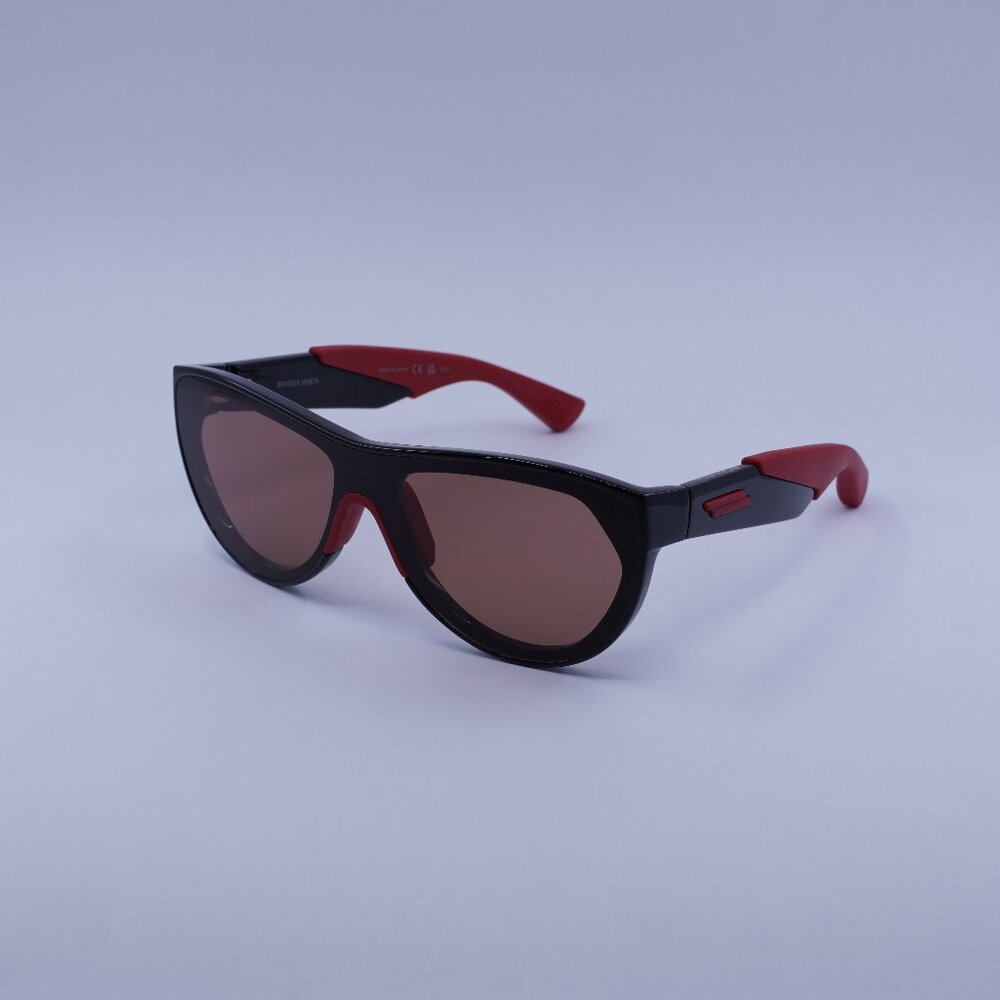 Bottega Veneta BV1234S 004 Sunglasses Shiny Black/Red Shield Frame, Red Lenses